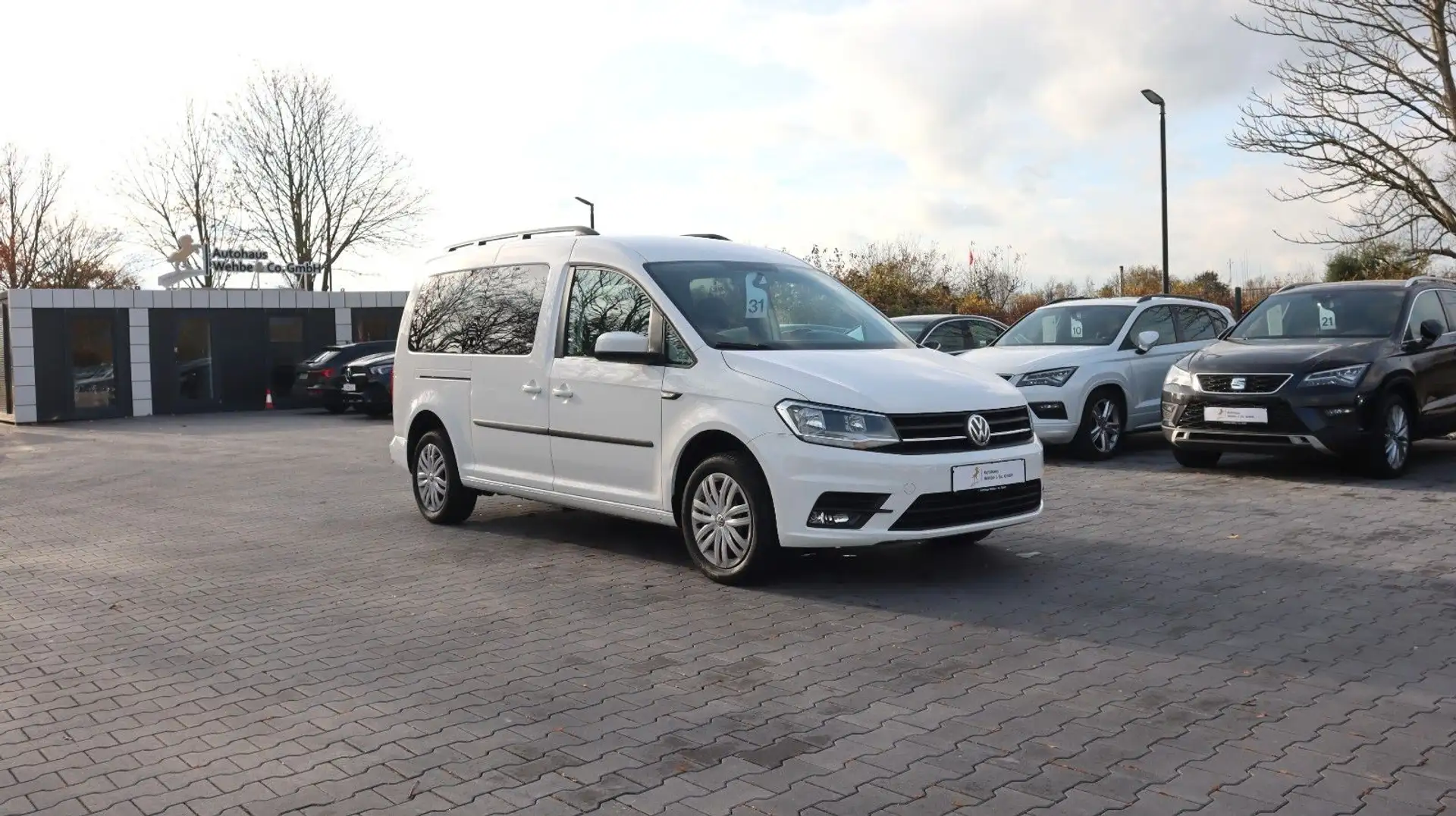 Volkswagen Caddy 1.4 TSI Maxi 7 Sitze AHK CarPlay Temp. PDC Белый - 1