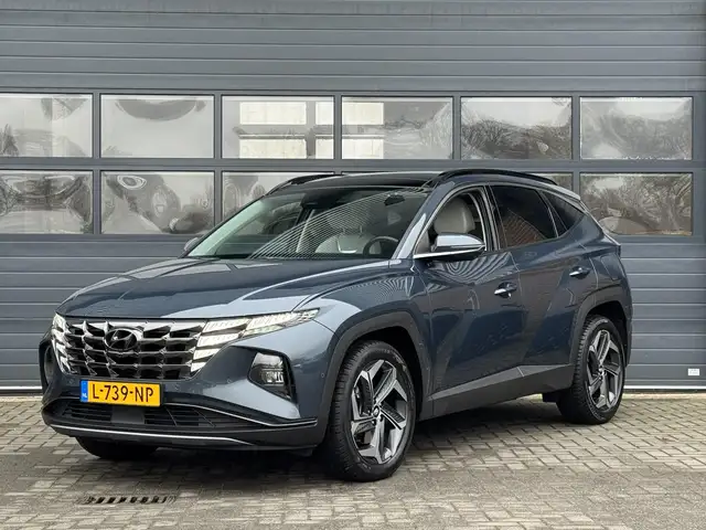 Hyundai TUCSON 1.6 T-GDI HEV PREMIUM SKY I SCHUIF/KANTELDAK I STO