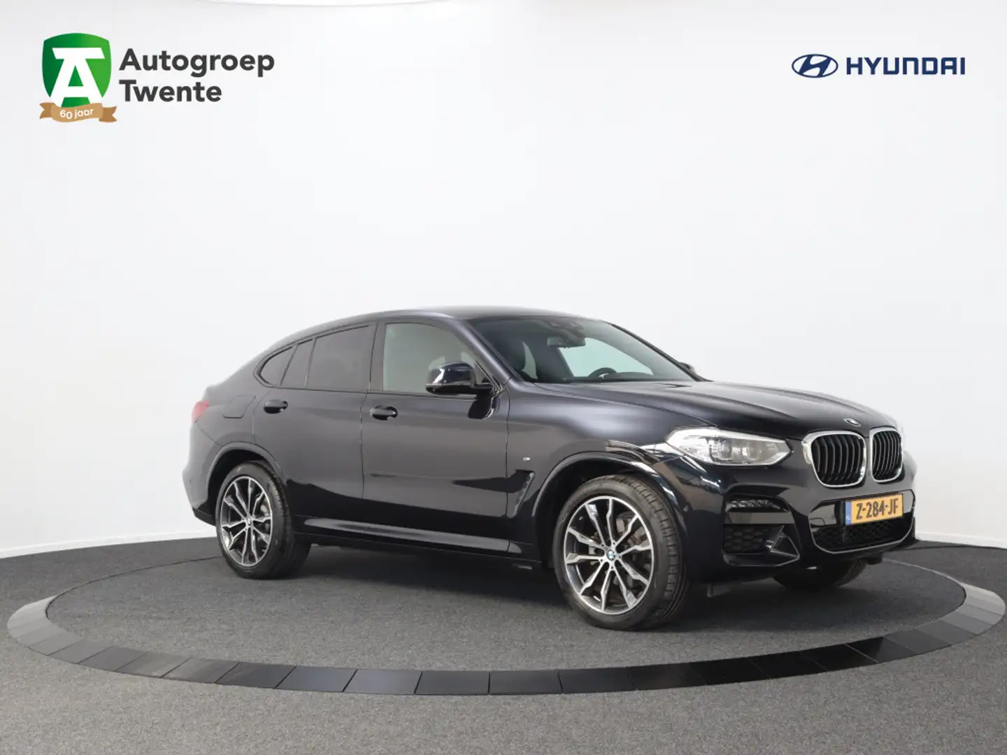BMW X4 xDrive20i M-Sport Business+ | Leder | 360 Camera | Zwart - 1