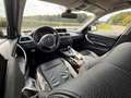 BMW 320 3-serie Touring 320i High Executive Schwarz - thumbnail 19
