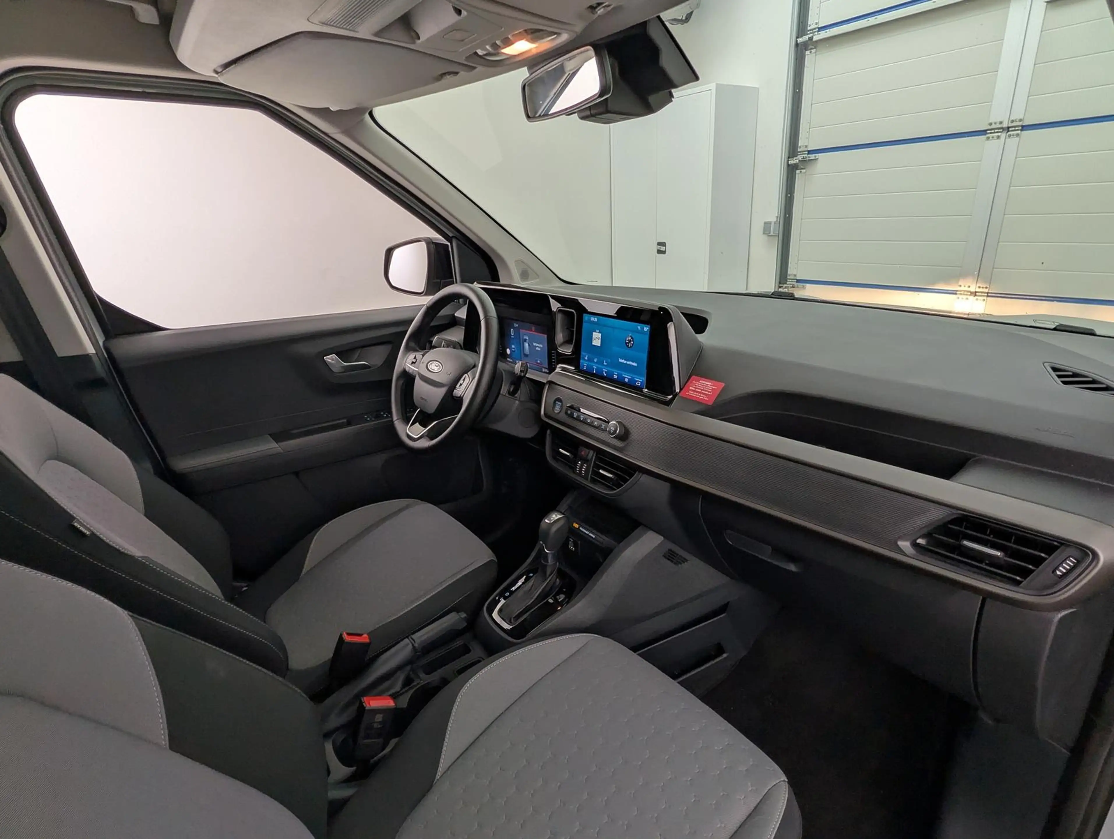 Ford Tourneo Courier 1.0 EcoB Aut. Titanium Kam+Tempo — photo 15