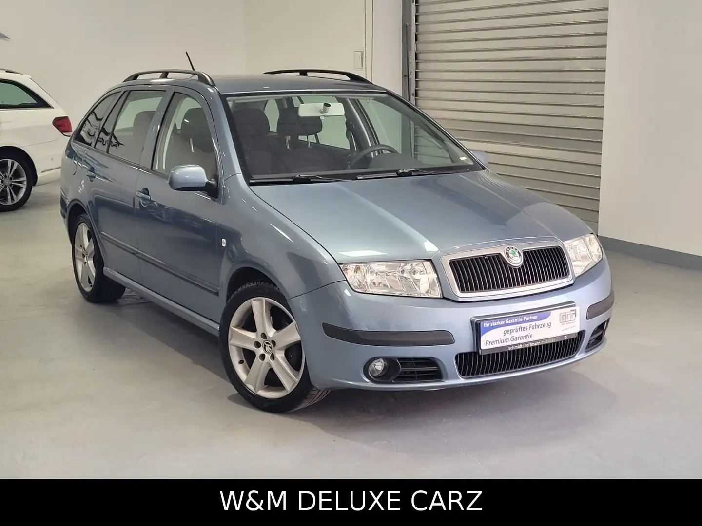 Skoda Fabia Combi Ambiente/PDC/Klima/SHZ/SHG/2HD/ Gris - 2