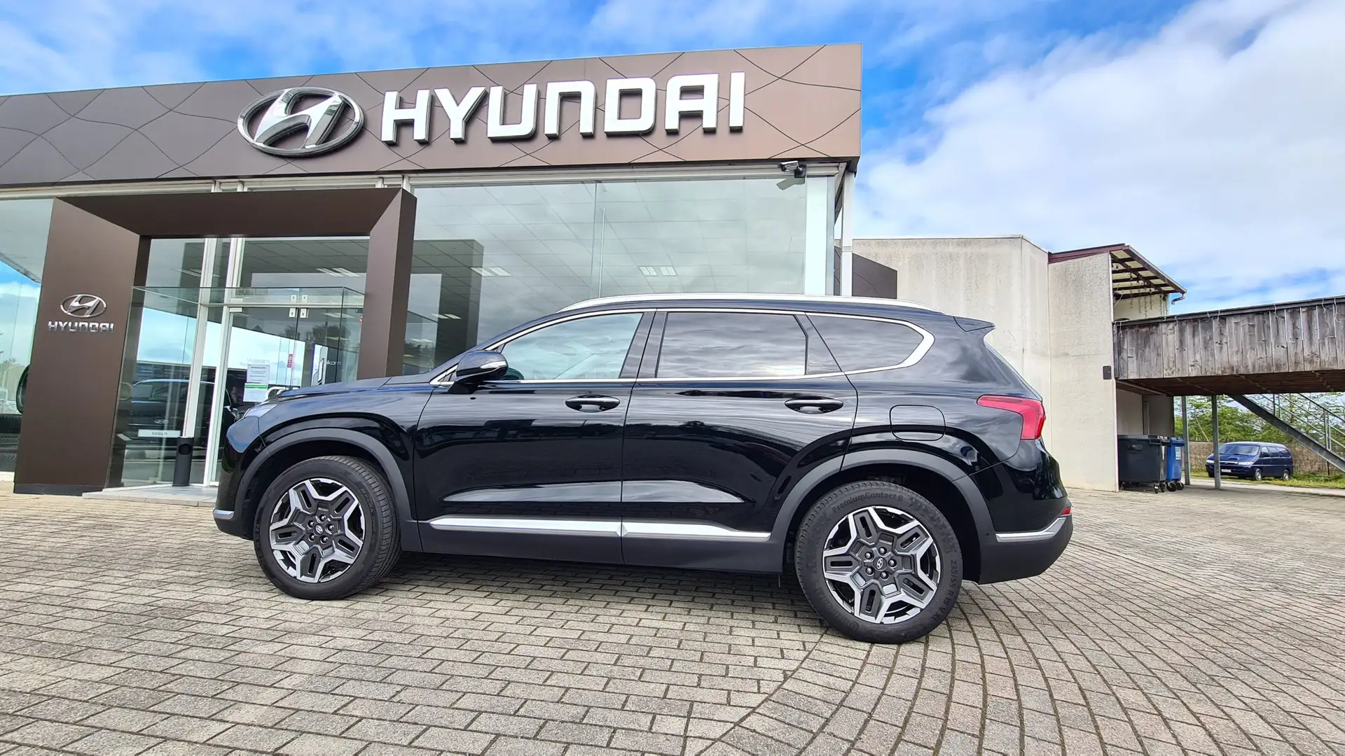 Hyundai SANTA FE 1.6 T-GDi HEV Shine S/S Zwart - 1