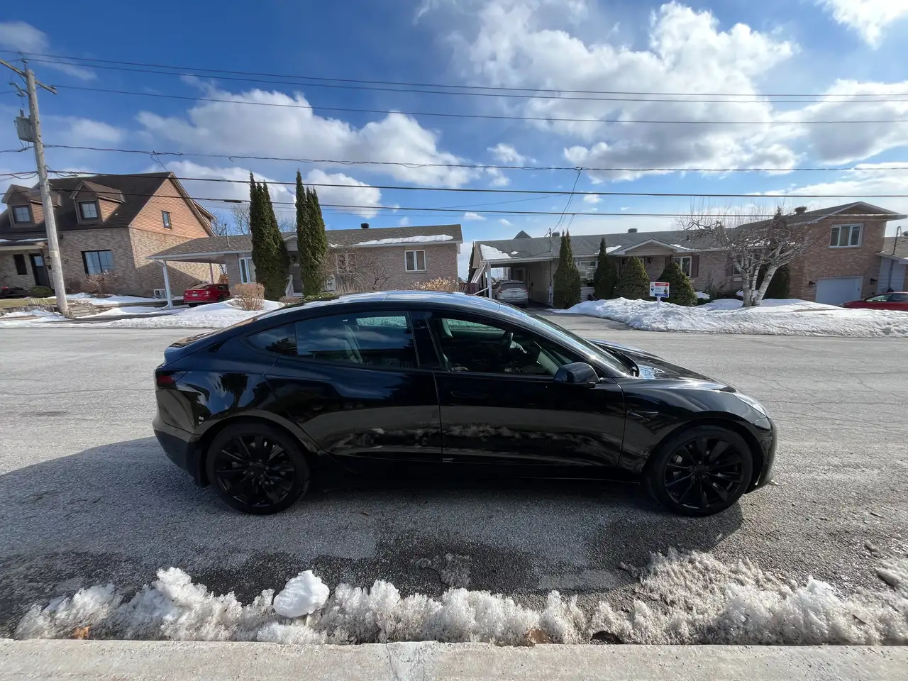 Tesla Model 3 photo Tesla Model 3