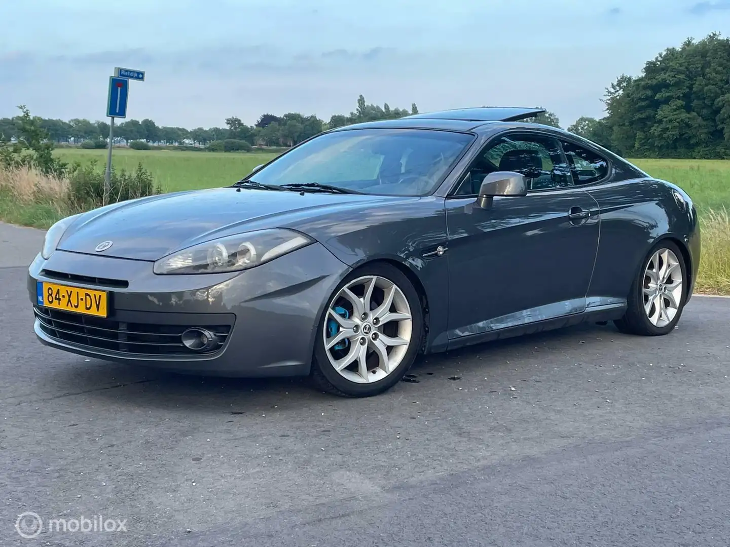 Hyundai Coupe 2.0i CVVT Dynamic Tuscani Grijs - 1