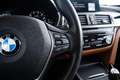 BMW 320 3-serie Gran Turismo 320i High Executive Luxury Li Zwart - thumbnail 22