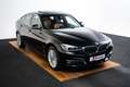 BMW 320 3-serie Gran Turismo 320i High Executive Luxury Li Zwart - thumbnail 24