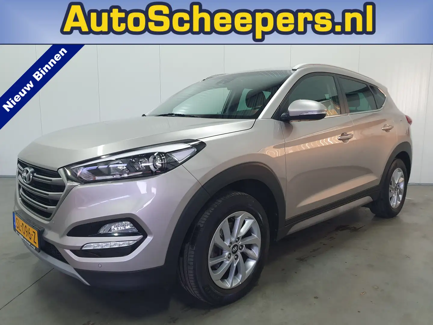 Hyundai TUCSON 1.6 GDi Comfort NAVI/CRUISE/AIRCO/LMV Grijs - 1