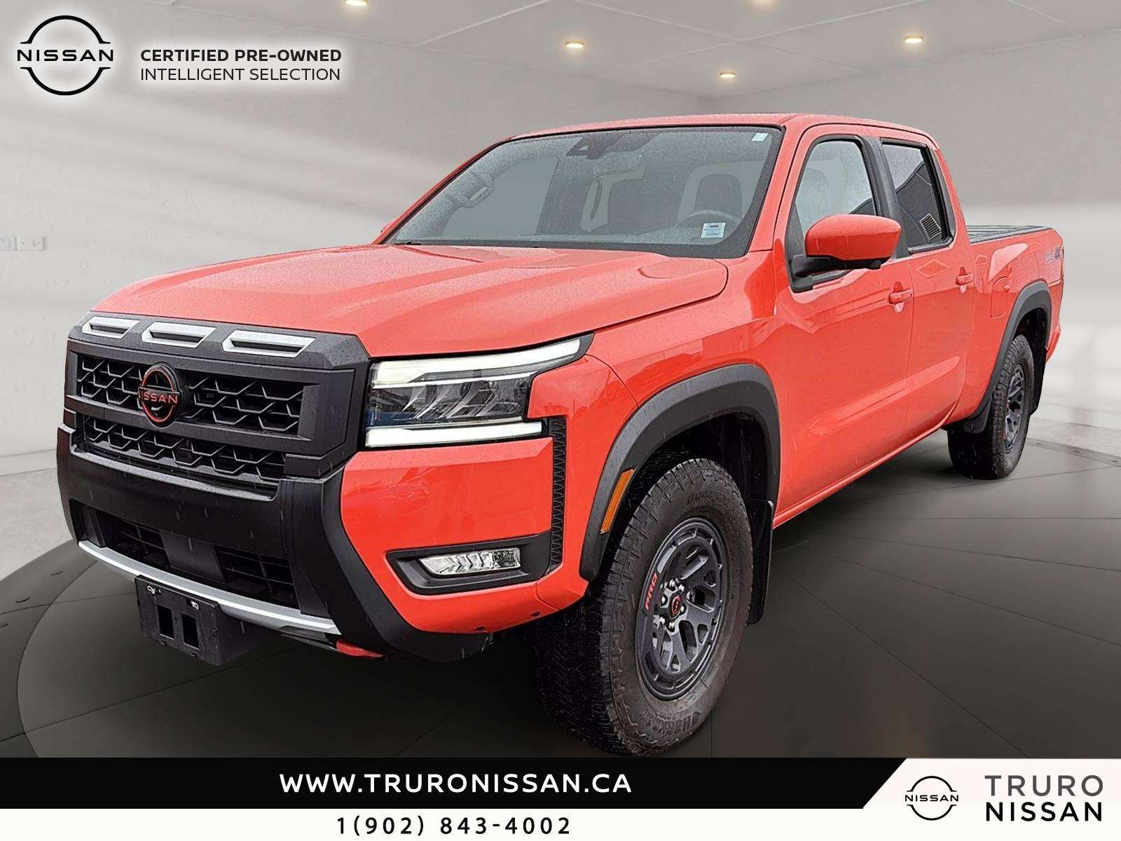 Orange 2025 Nissan Frontier Pickup Truck Four-Wheel Drive 9-Speed Automatic