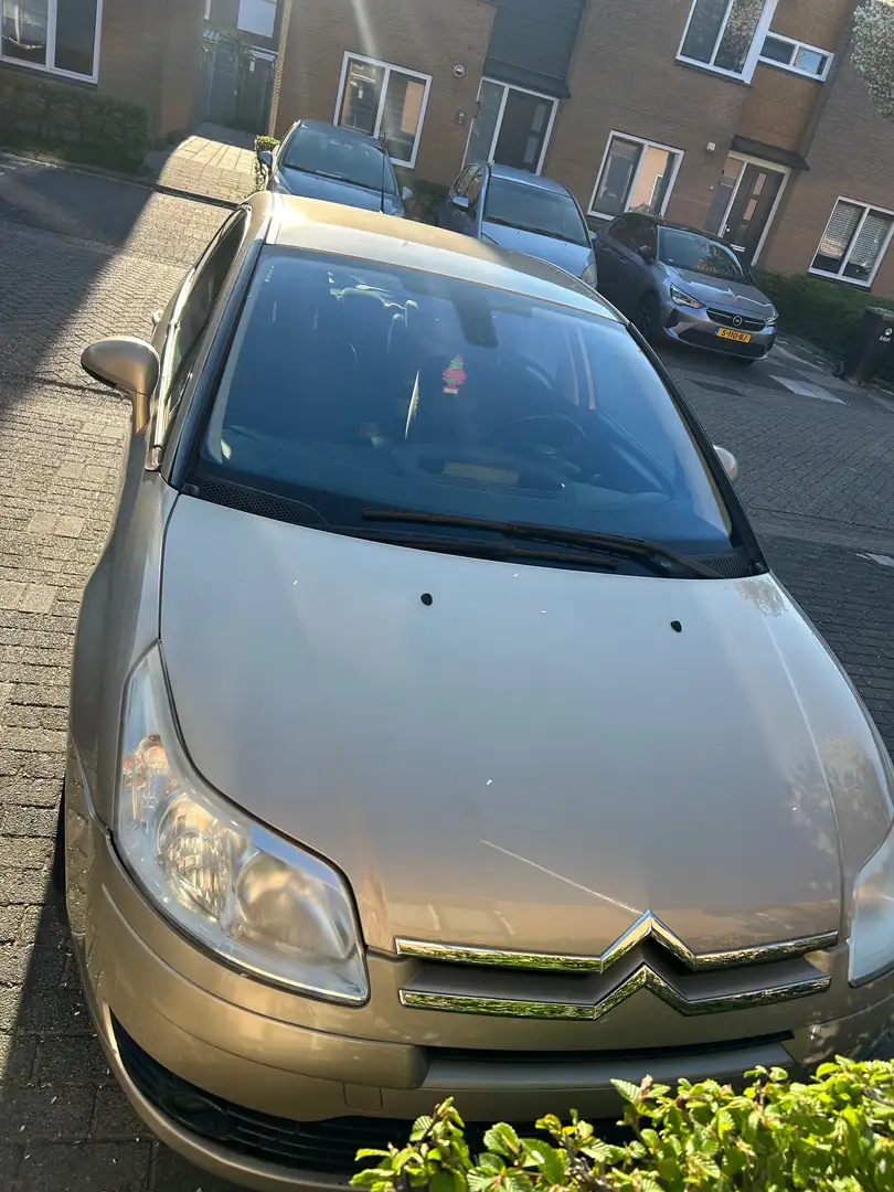 Citroen C4 1.6-16V L. Ambiance Goud - 1