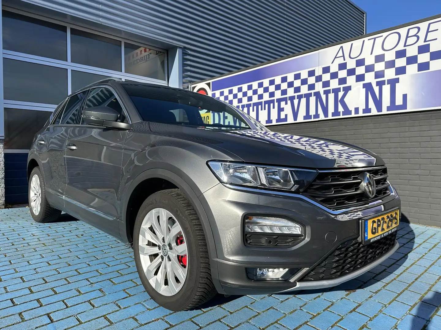 Volkswagen T-Roc 1.5 TSI Sport ADAP CRUISE APPLE STOELVERW. Grijs - 1