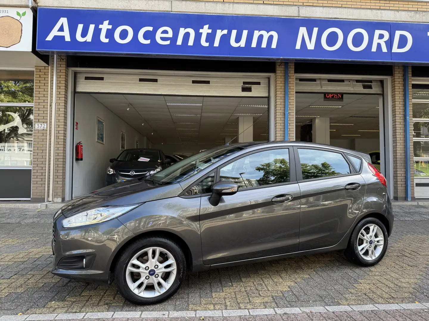 Ford Fiesta 1.0 Style 72575KM! | Airco | Stoelverwarming | Lic Grijs - 1