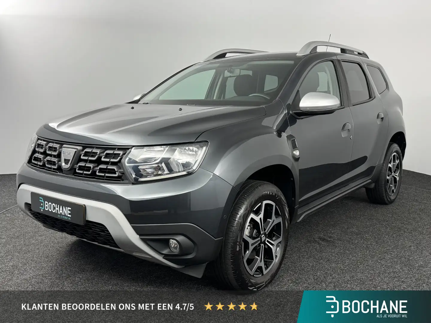 Dacia Duster 1.0 TCe 100 Bi-Fuel Prestige | Navigatie | Airco | Gris - 1