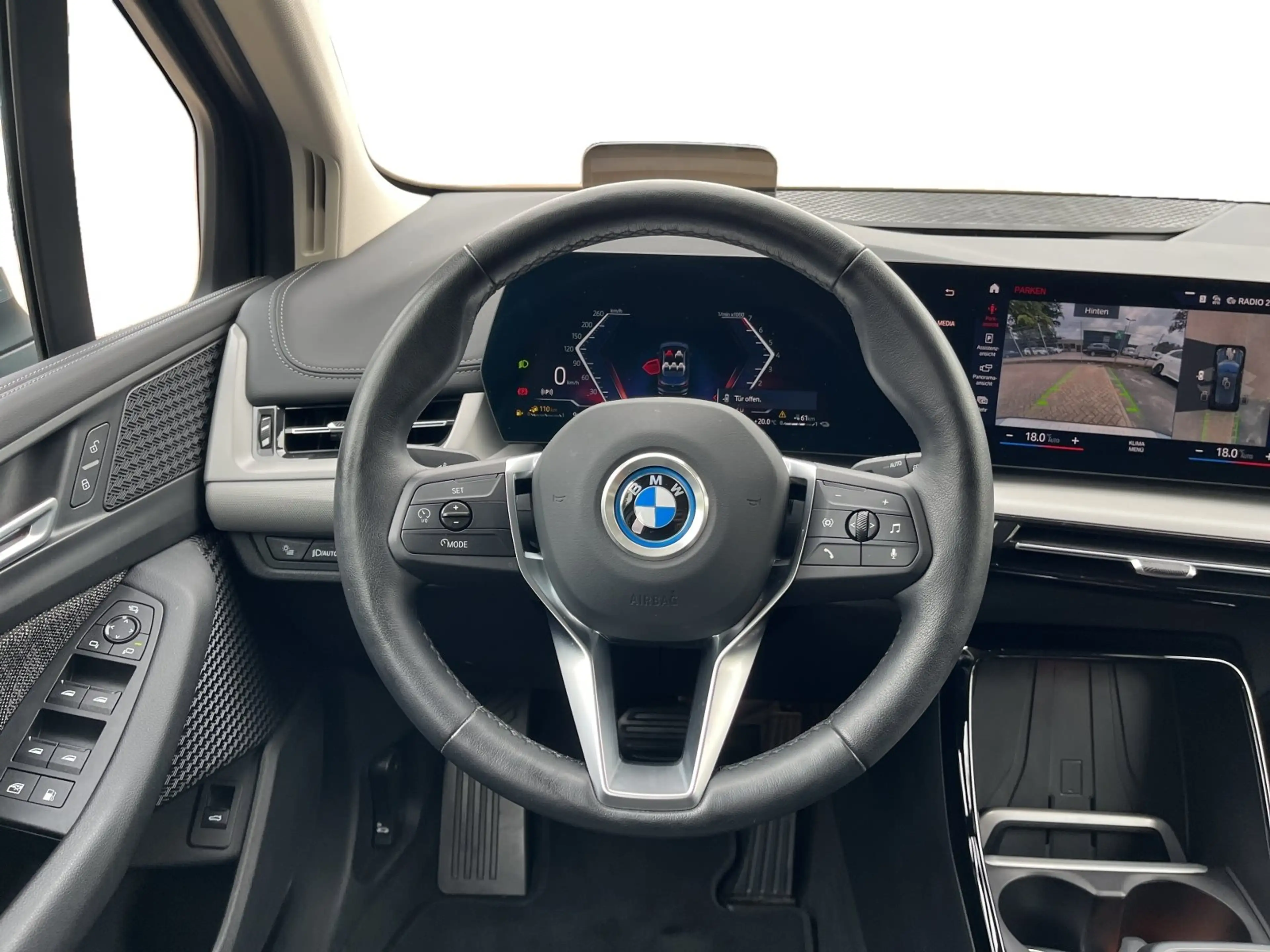 BMW 225 e xDrive — photo 11