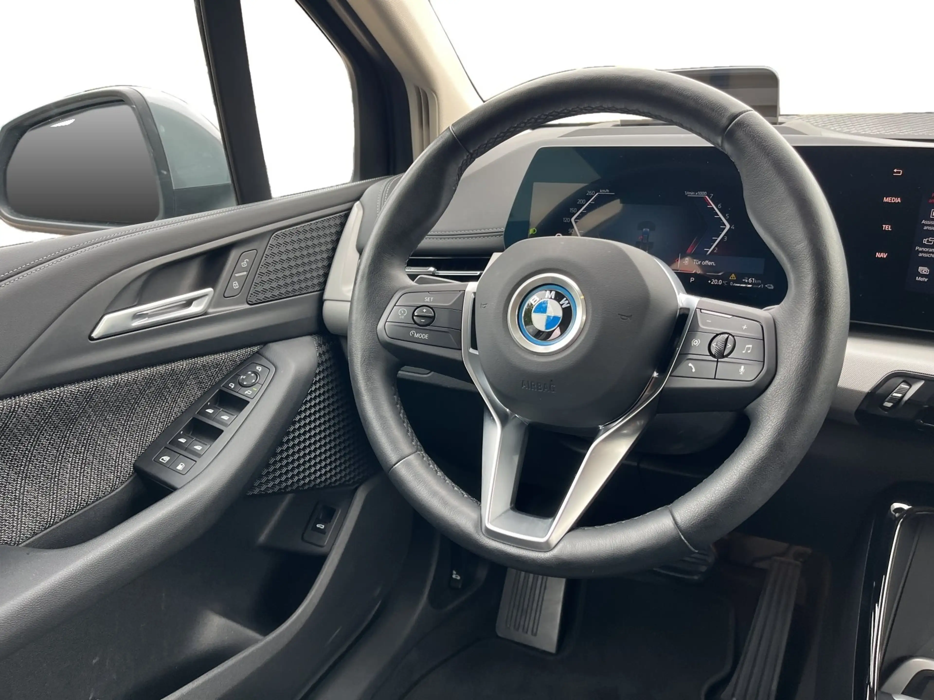 BMW 225 e xDrive — photo 14
