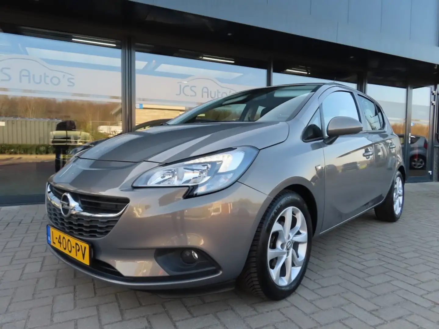 Opel Corsa-e 1.4 Edition Airco Cruise Navi 16 Inch 2015 Grigio - 1