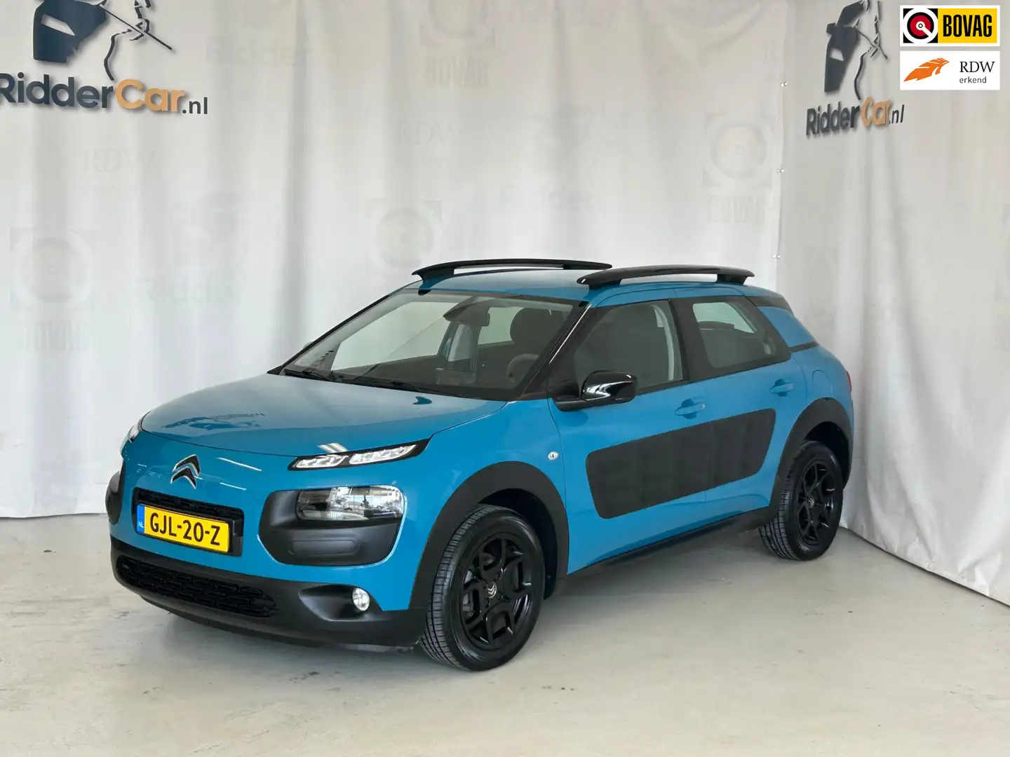 Citroen C4 Cactus 1.2 PureTech One-Tone|1E EIG in NL|NAVI|CRUISE|AIR Kék - 1