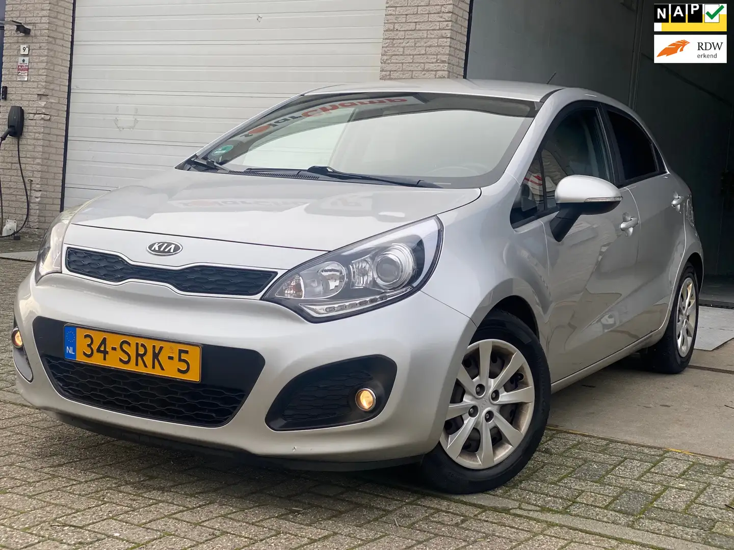 Kia Rio 1.2 CVVT Plus Pack/5drs/nap/2e EIG/dealeronderhoud Grijs - 1