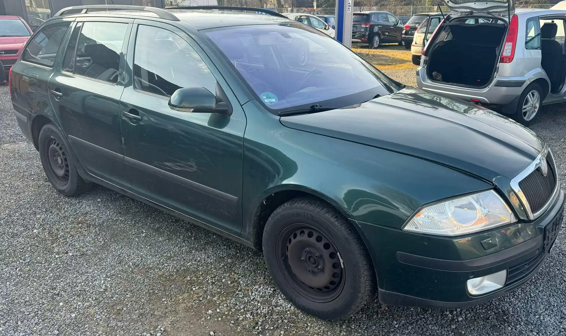 Skoda Octavia 2.0 TDI DSG Combi Xenon Navi Sitzh AHK Grün - 1
