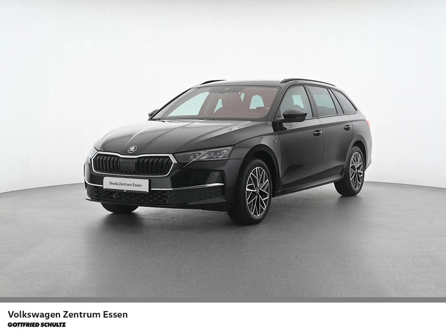 Skoda Octavia Combi Tour TDI DSG Navi AHK Sitzhzg Schwarz - 1