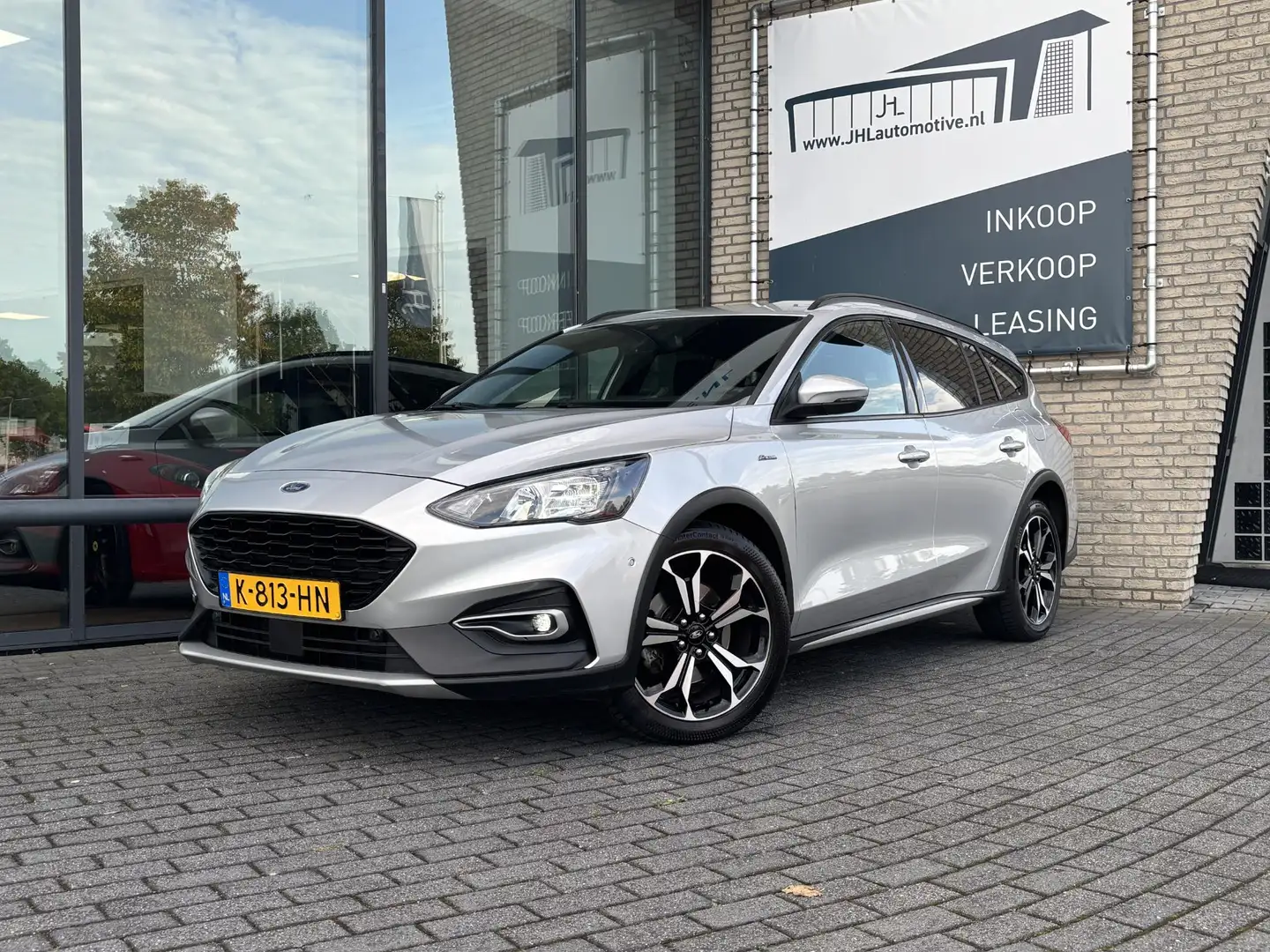 Ford Focus Wagon 1.0 EcoBoost Hybrid Active*ECC*NAVI*ACC*HAAK Grijs - 1
