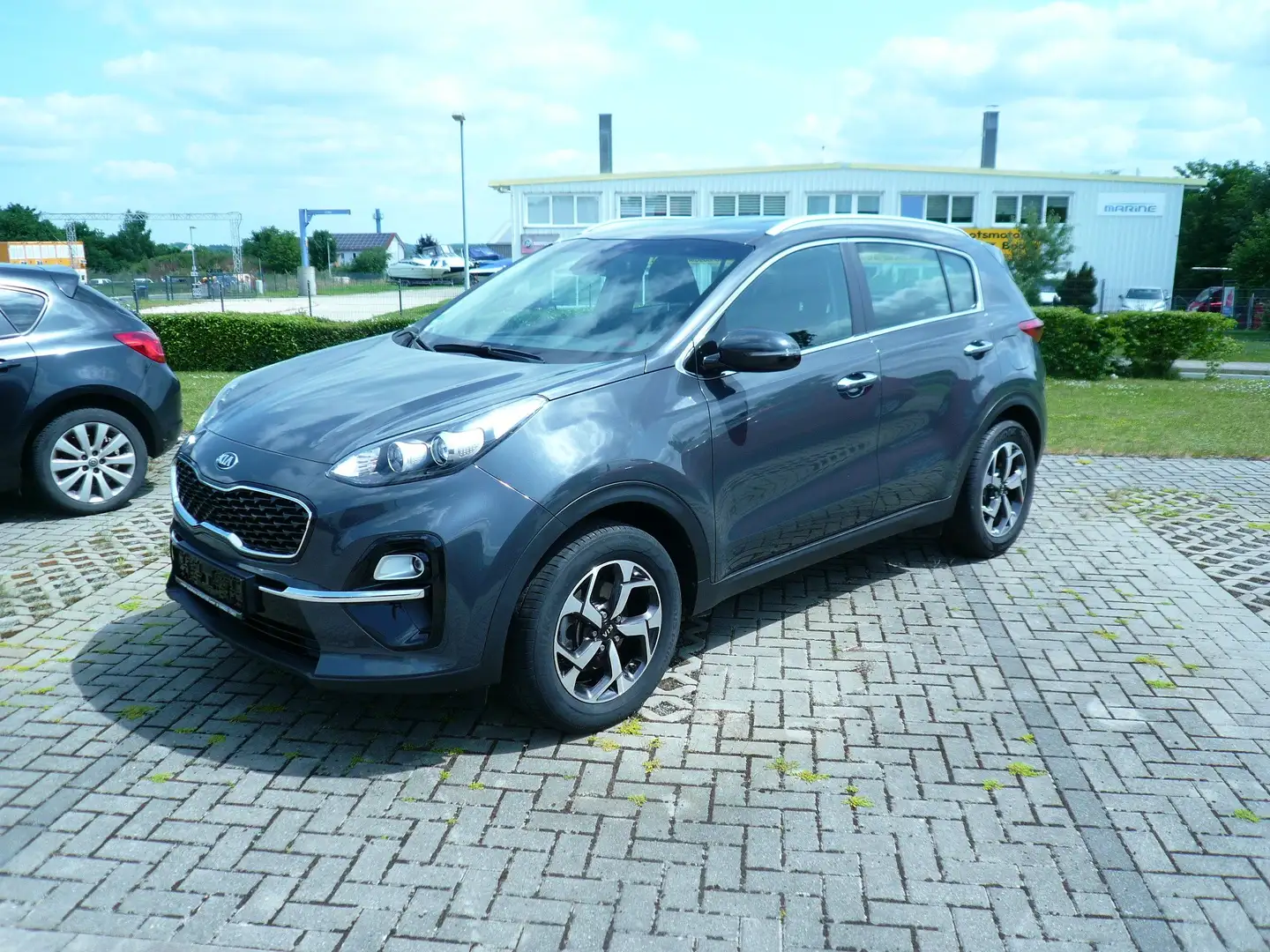 Kia Sportage 1.6 GDI 2WD Navi Sitzheizung Alufelgen Grau - 1