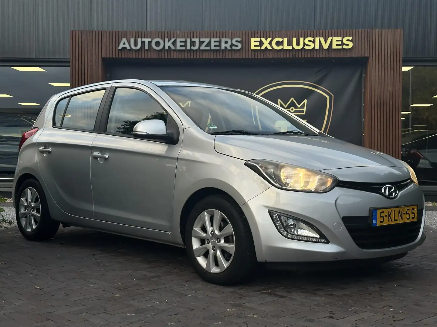 Hyundai i20 1.2i i-Deal LPG Airco Cruise 15'' Trekhaak Grijs - 1