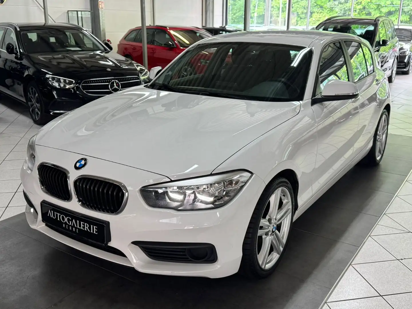 BMW 118 i* M ALU *NAVI*KLIMA*PDC*SITZHZG*2.HAND* Weiß - 1