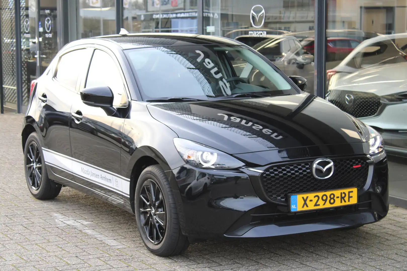 Mazda 2 1.5 e-SkyActiv-G 90 Homura , Demovoordeel € 1.290- Zwart - 2