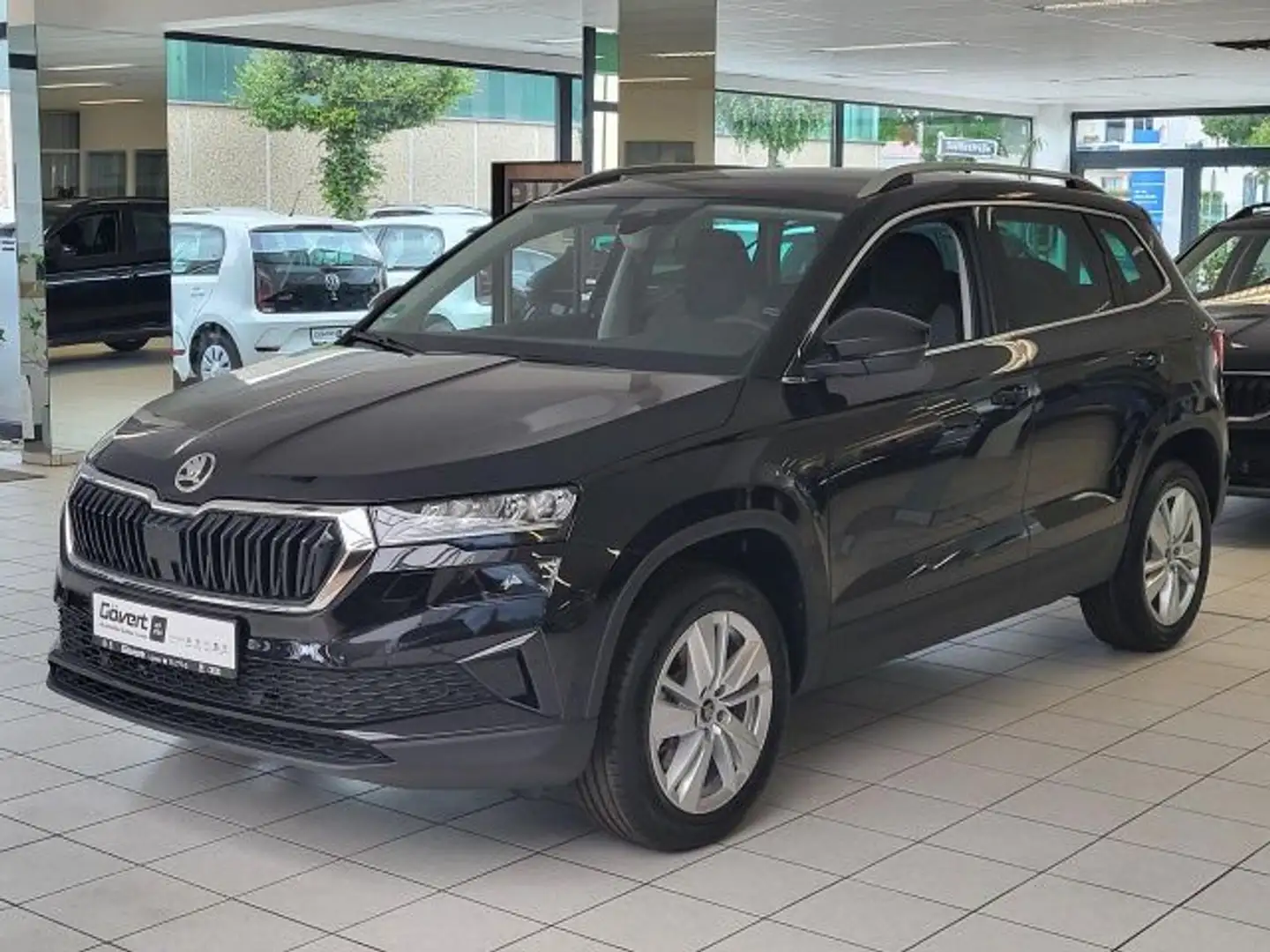Skoda Karoq 1.5 Selection DSG Navi AHK ACC LED Klima Schwarz - 1