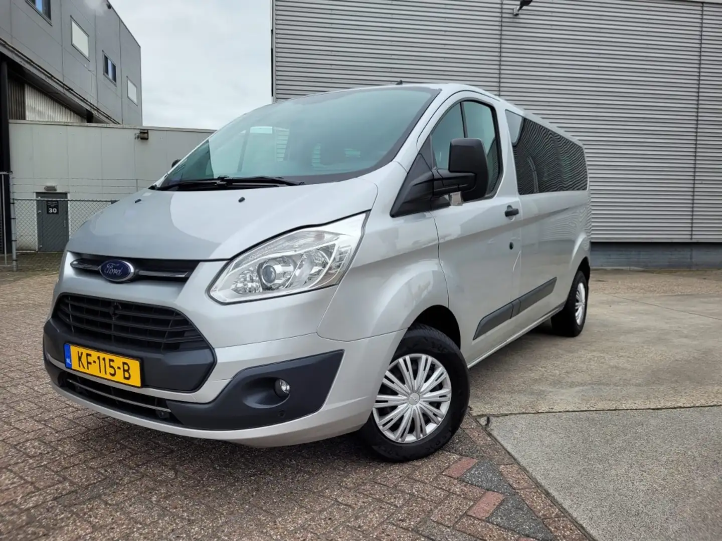 Ford Transit Custom 310 2.0 TDCI L2H1 Trend 9 personen Grijs - 1