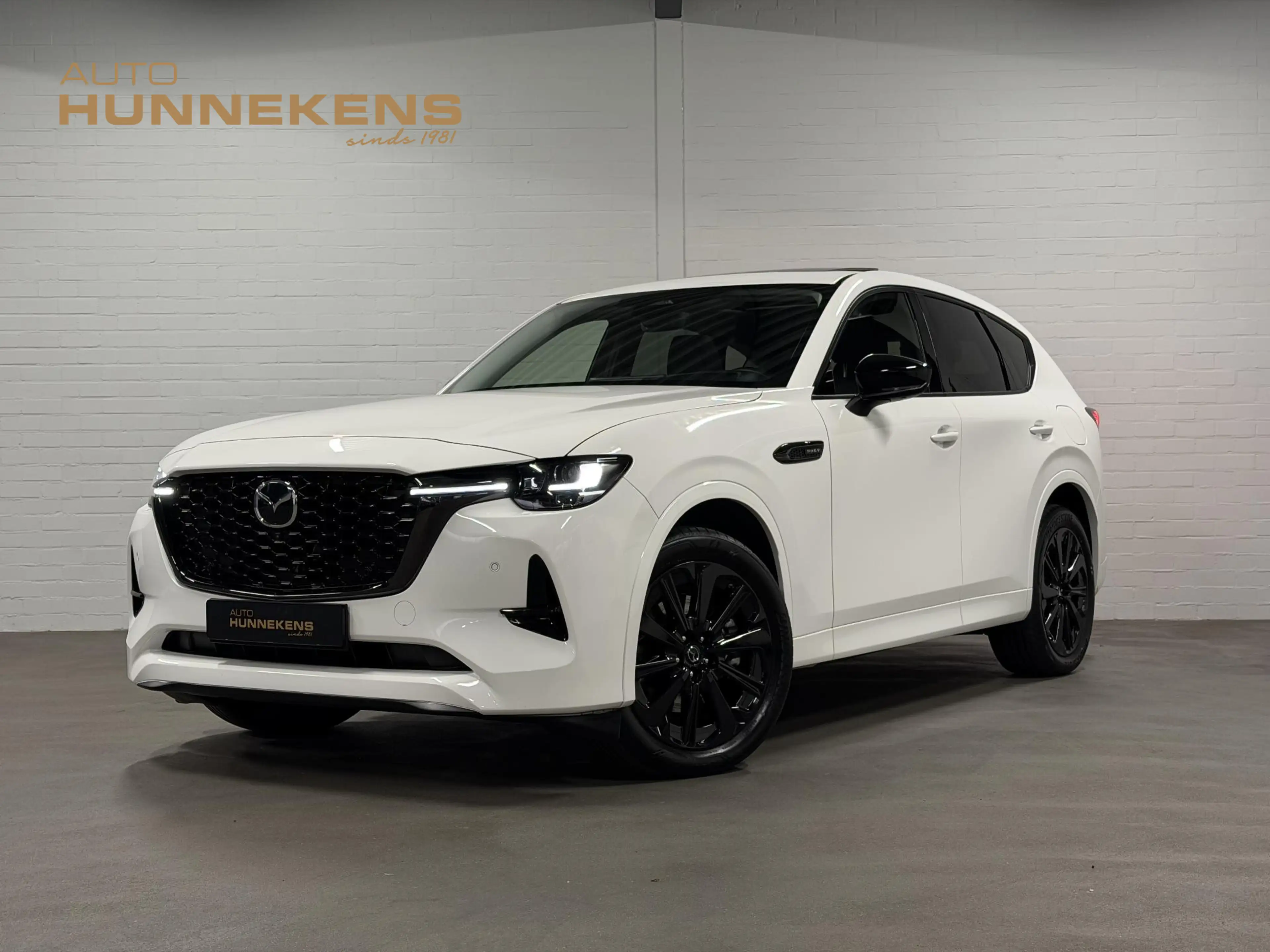Mazda CX-60 2.5 e-SkyActiv PHEV Homura *SOH 97%* Open dak | Ad