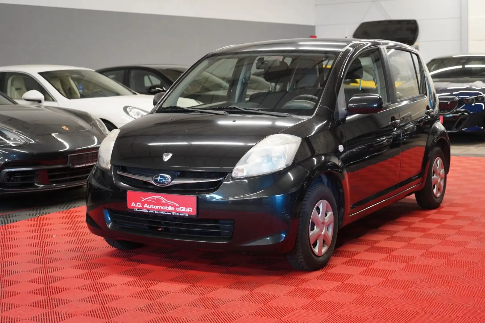 Subaru Justy 1.0 Lim. 1.Hand*Klimaanlge*8Fach* Schwarz - 1