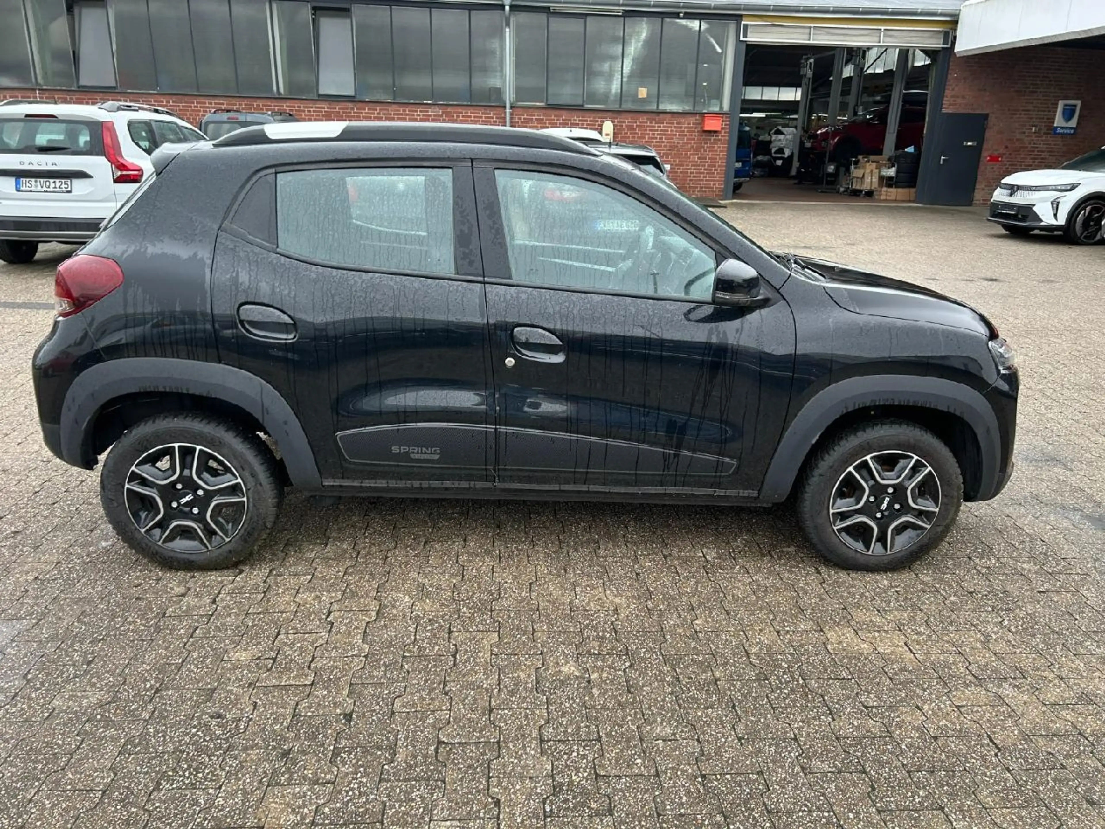 Dacia Spring Essential*Klima*Navi*DAB*Kamera*Teilleder — photo 6