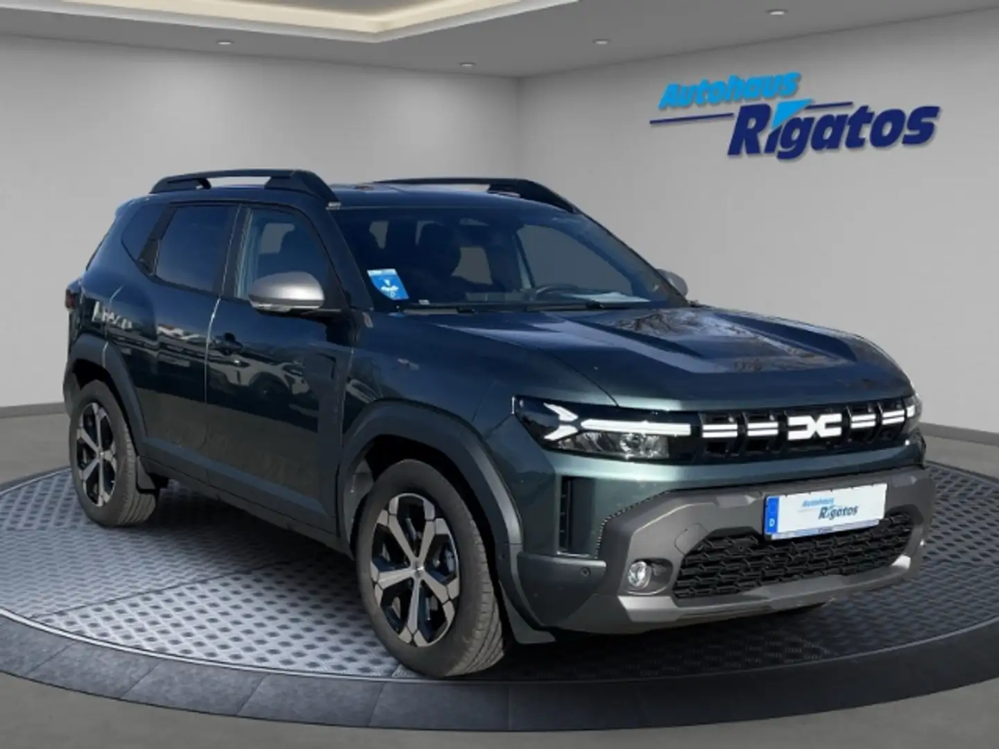 Dacia Duster III 1.2 TCe 130 Mild Hybrid Journey Navi, Sitzheiu Grün - 1