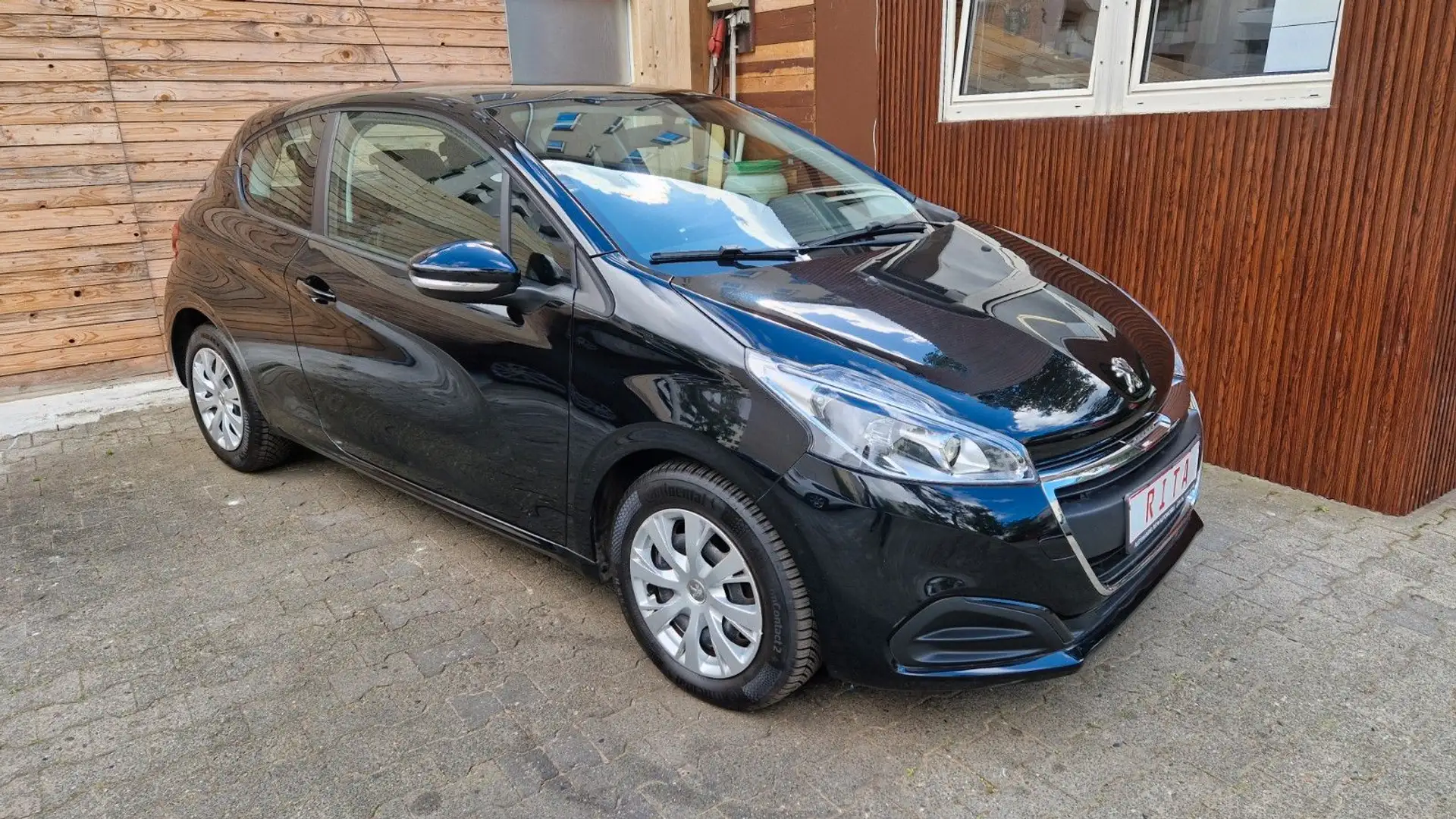 Peugeot 208 Klima, Isofix, Bluetooth, Tempomat Schwarz - 2