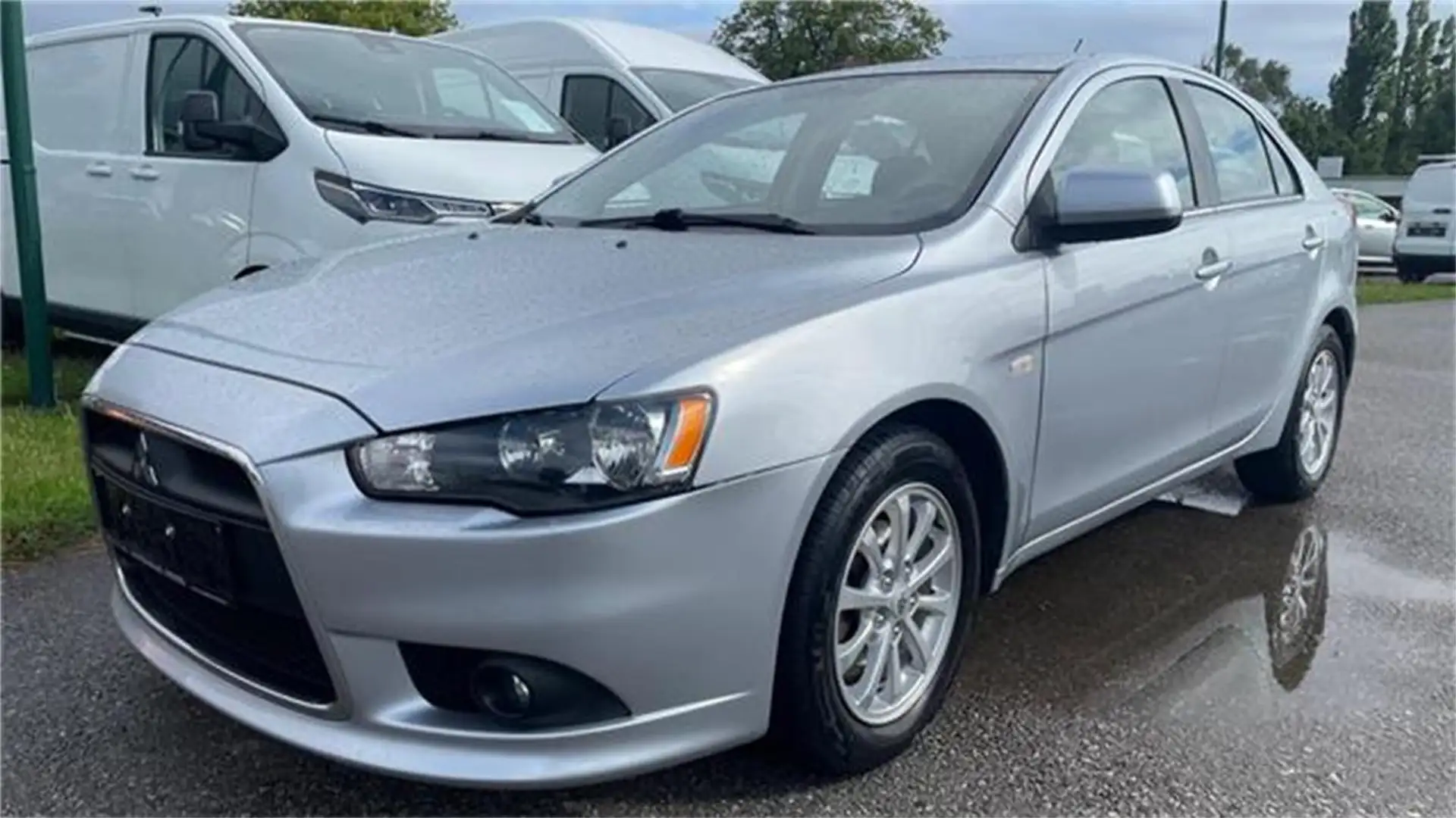 Mitsubishi Lancer Sportback 1,6 Invite Austria Edition Argintiu - 1