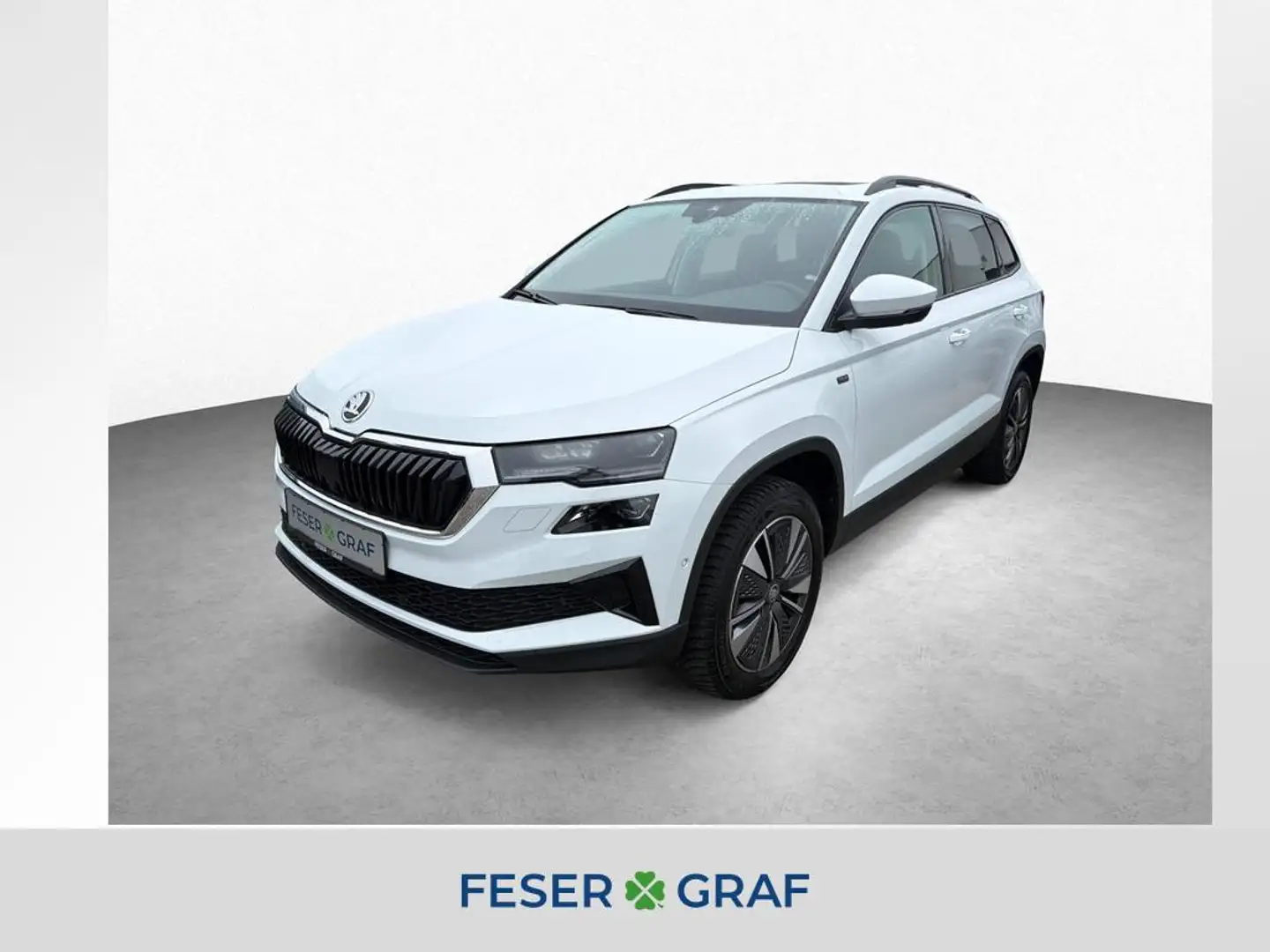 Skoda Karoq Tour 1.5TSI DSG*AHK*PANO*NAVI*MATRIX*uvm Weiß - 1