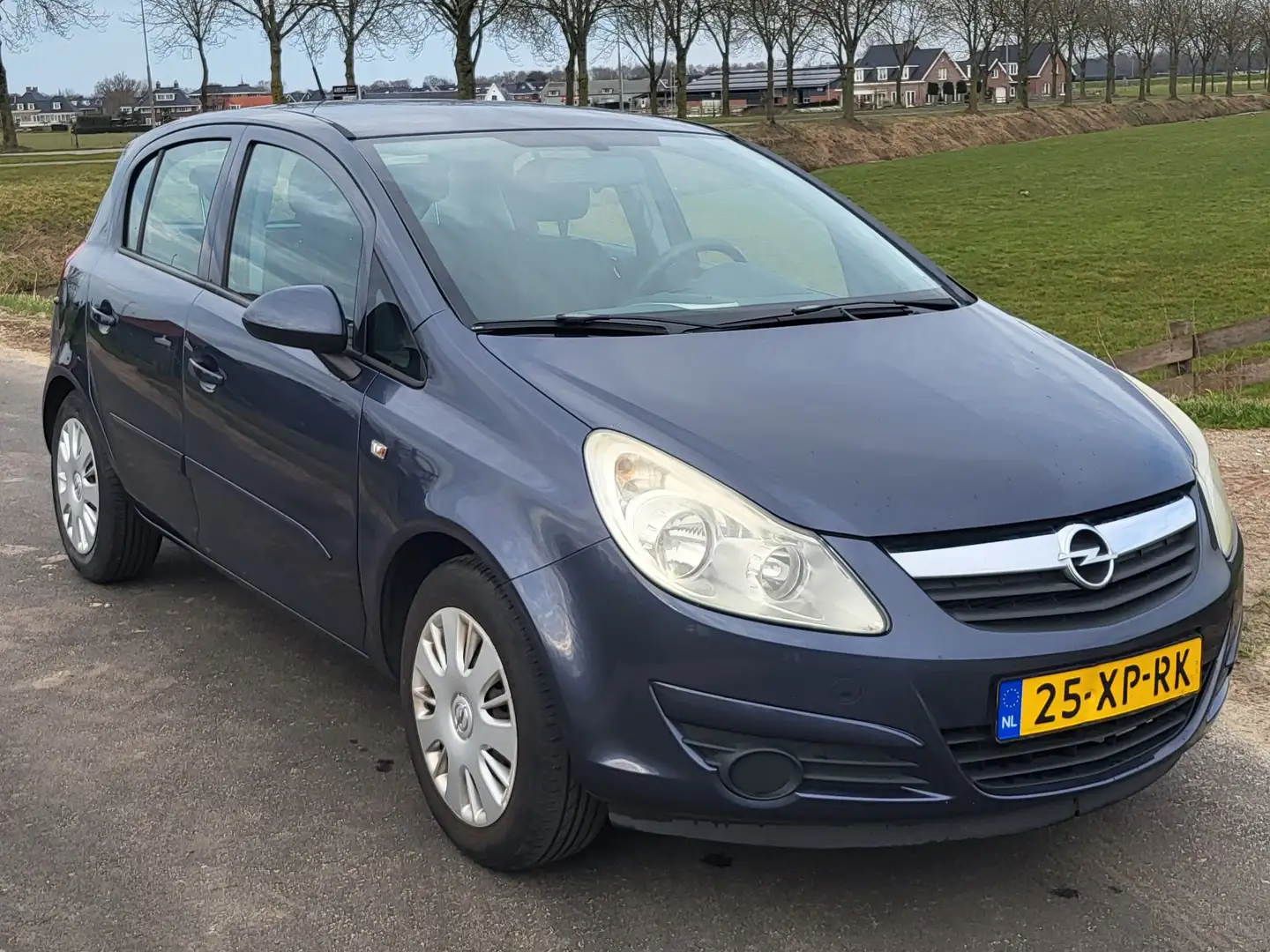 Opel Corsa Corsa+1.4-16V+Enjoy Zilver - 1