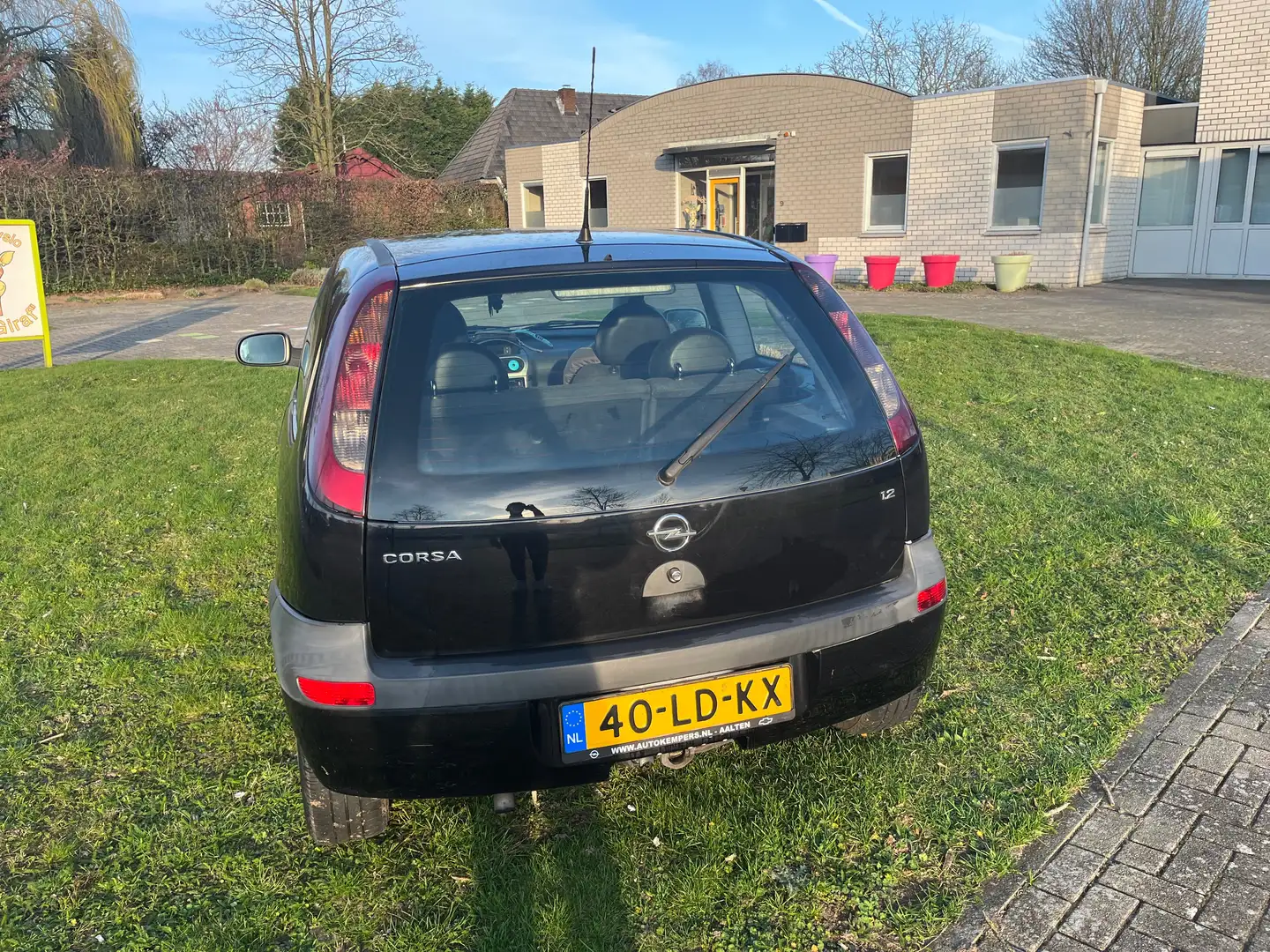 Opel Corsa 1.2-16V Njoy Zwart - 1