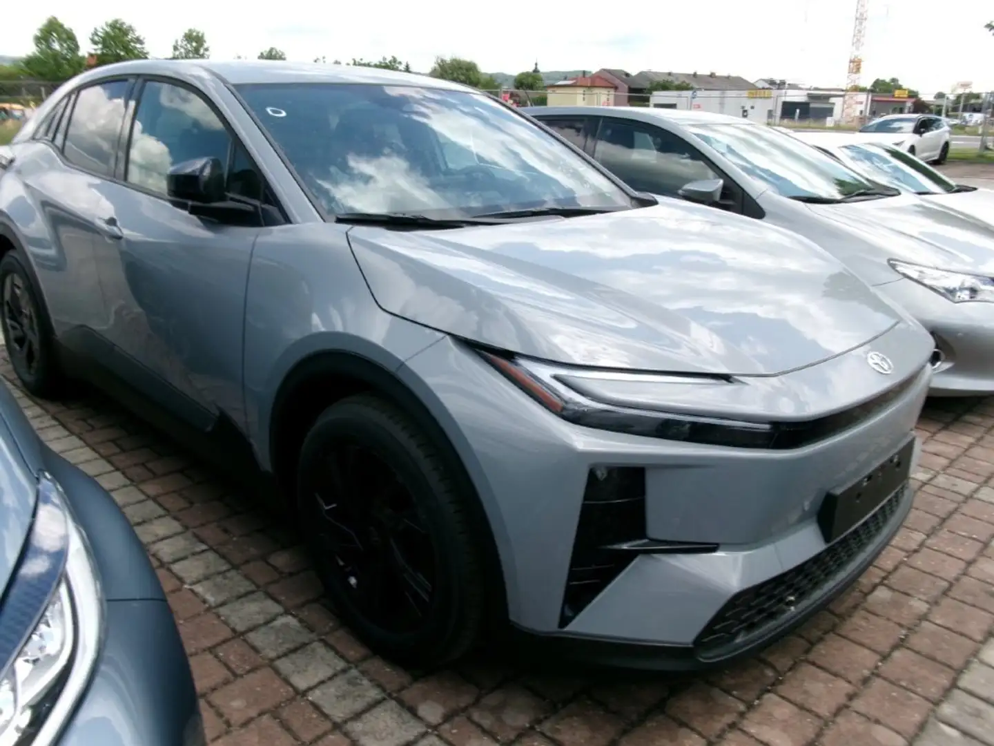 Toyota C-HR+ C-HR+ Elektro 77kWh Teamplayer !!! TOP FINANZIEREN Grau - 1