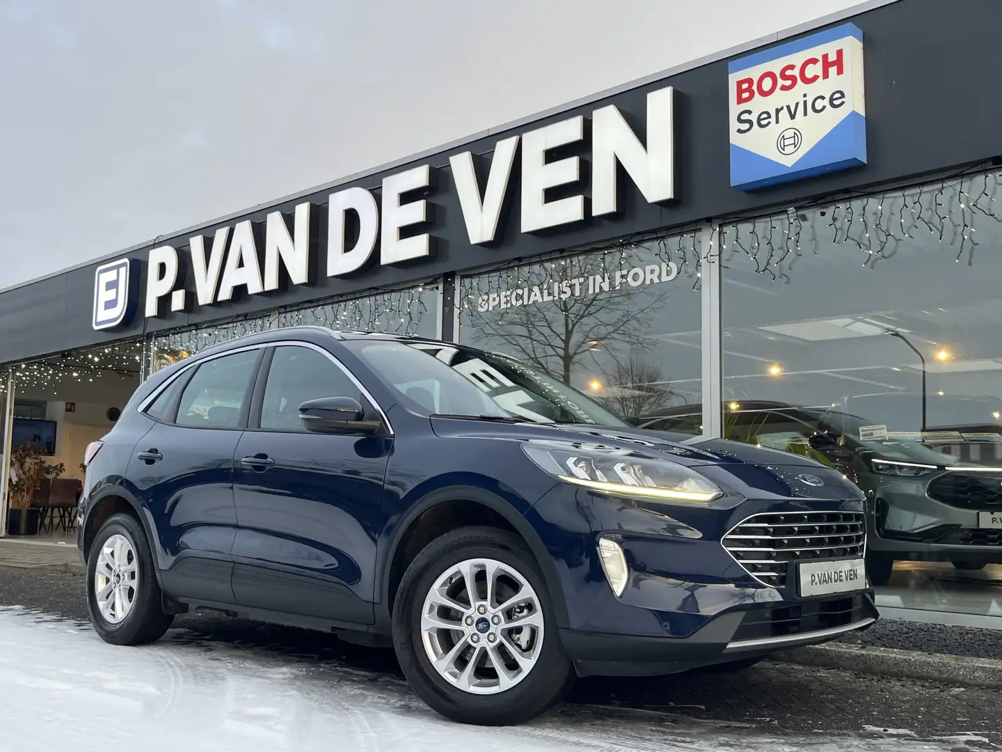 Ford Kuga 2.5 PHEV Titanium 225pk/165kW e-CVT Automaat | Kop Blau - 1