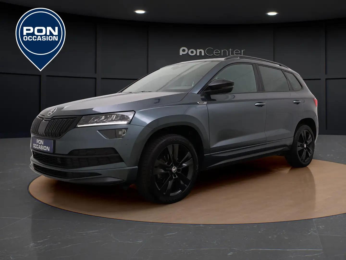 Skoda Karoq 1.5 TSI 150 PK DSG Sportline | Keyless | Apple Car Grijs - 1