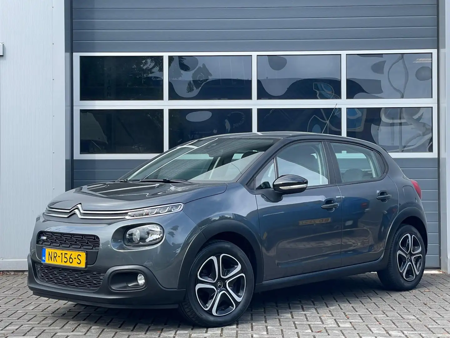 Citroen C3 1.2 PureTech Feel | Navi | Cruise control | PDC | Grijs - 1