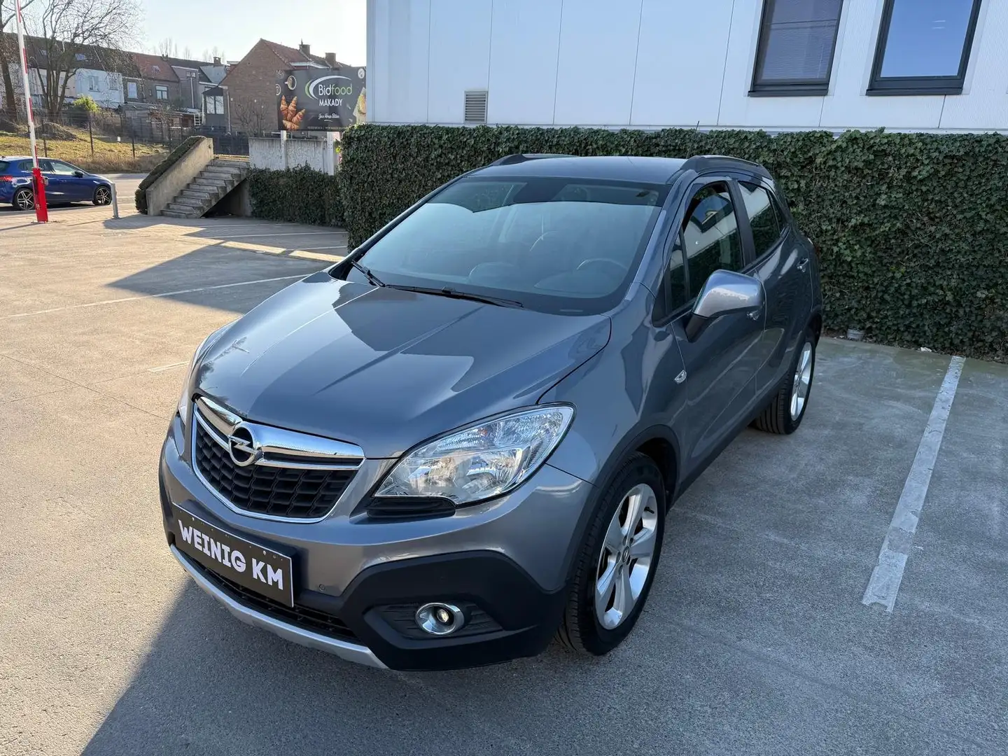 Opel Mokka 1.6i 4x2 **25000 Km CARPASS** 12M GARANTIE** Gris - 1
