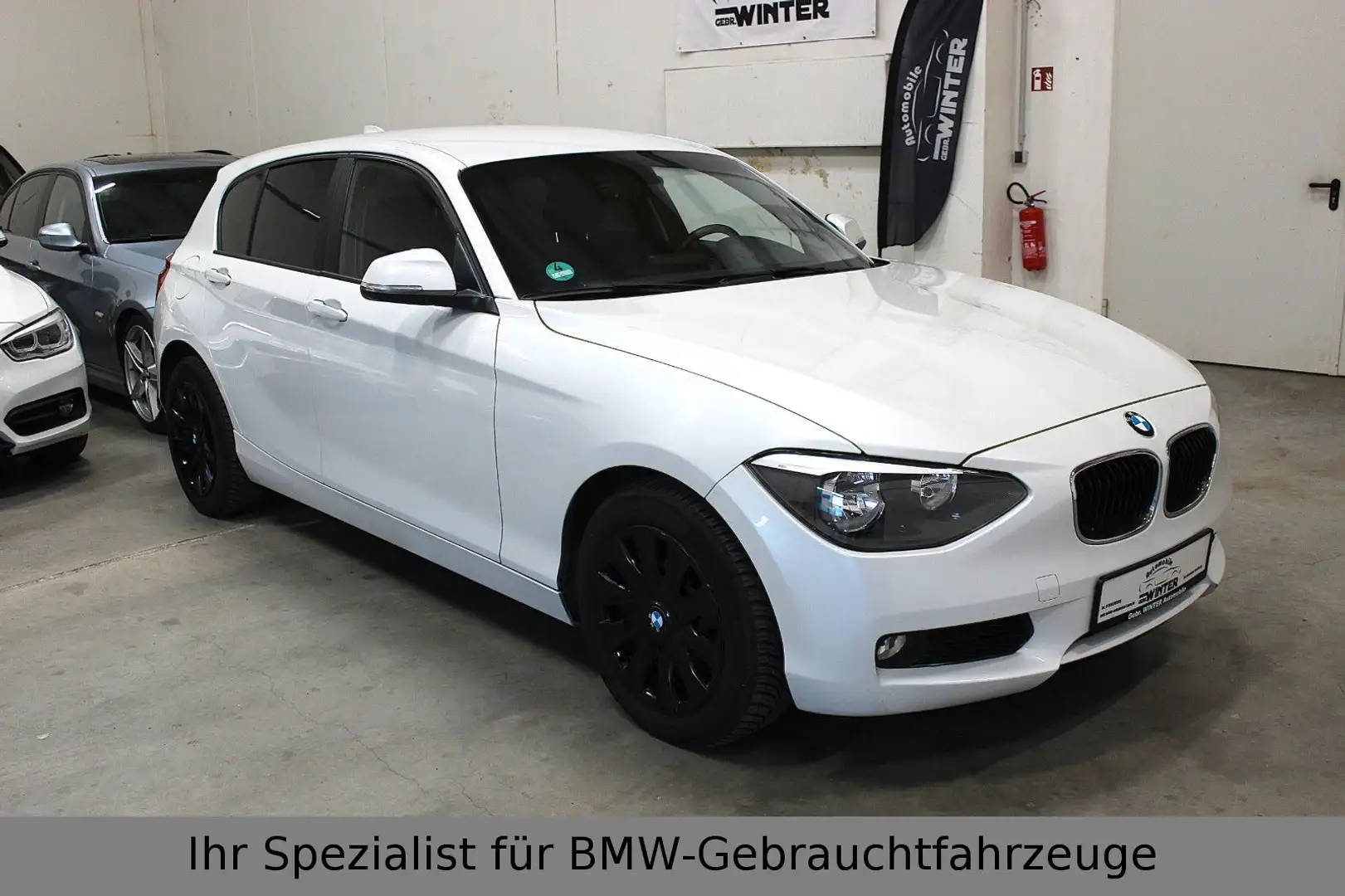 BMW 118 i Lim. 5-trg. SHZ*MFL Weiß - 1