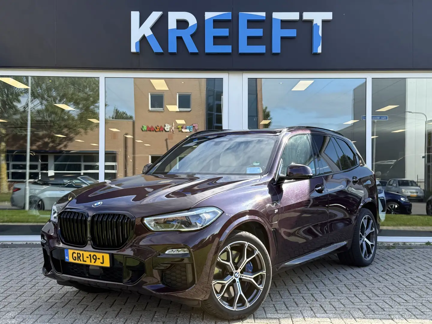 BMW X5 xDrive45e High Executive Violet | M Sport | Lucht Paars - 1