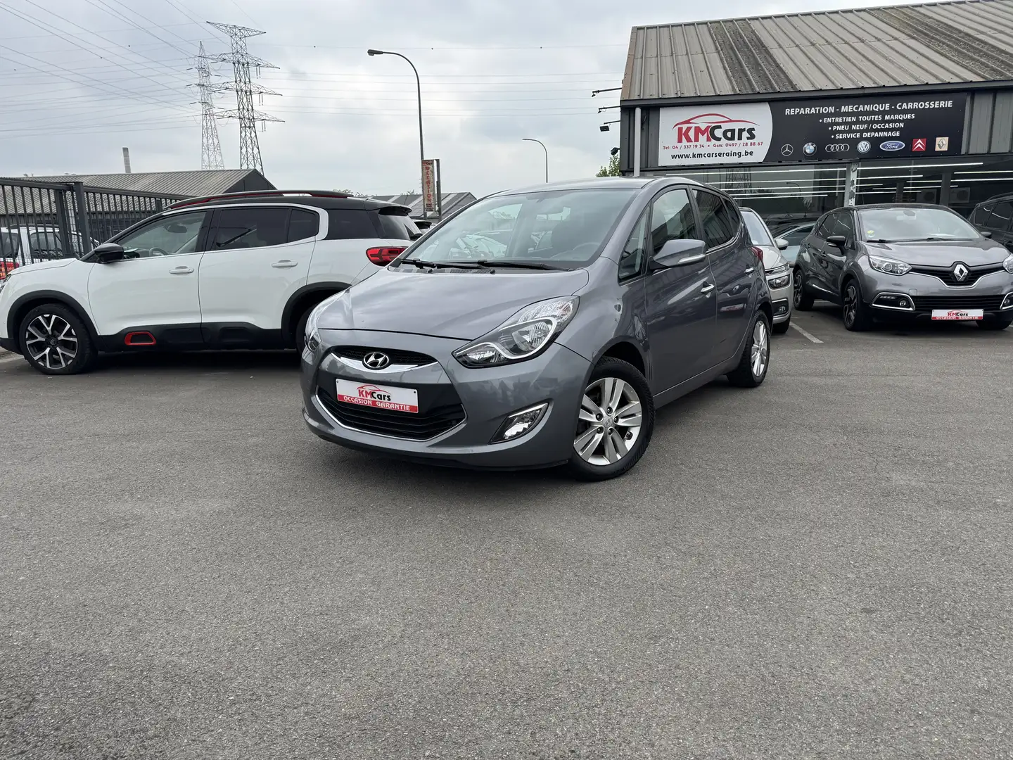 Hyundai iX20 1.4i ESSENCE /1'ier PROPRIETAIRE/AIRCO /NAVIGATION Grijs - 1