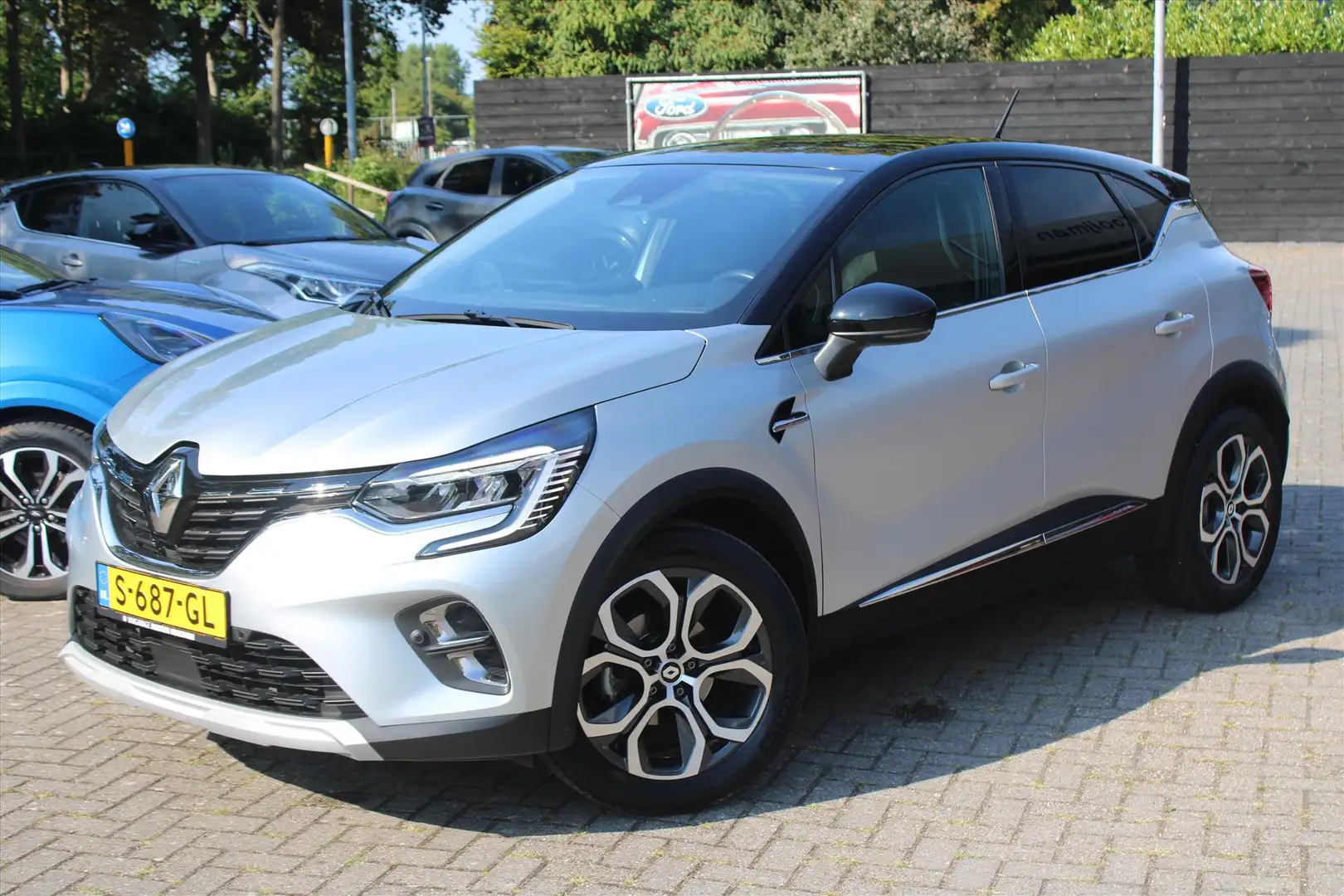 Renault Captur 1.3 TCe 140pk Hybrid GPF Intens, Trekhaak, Camera Gris - 1
