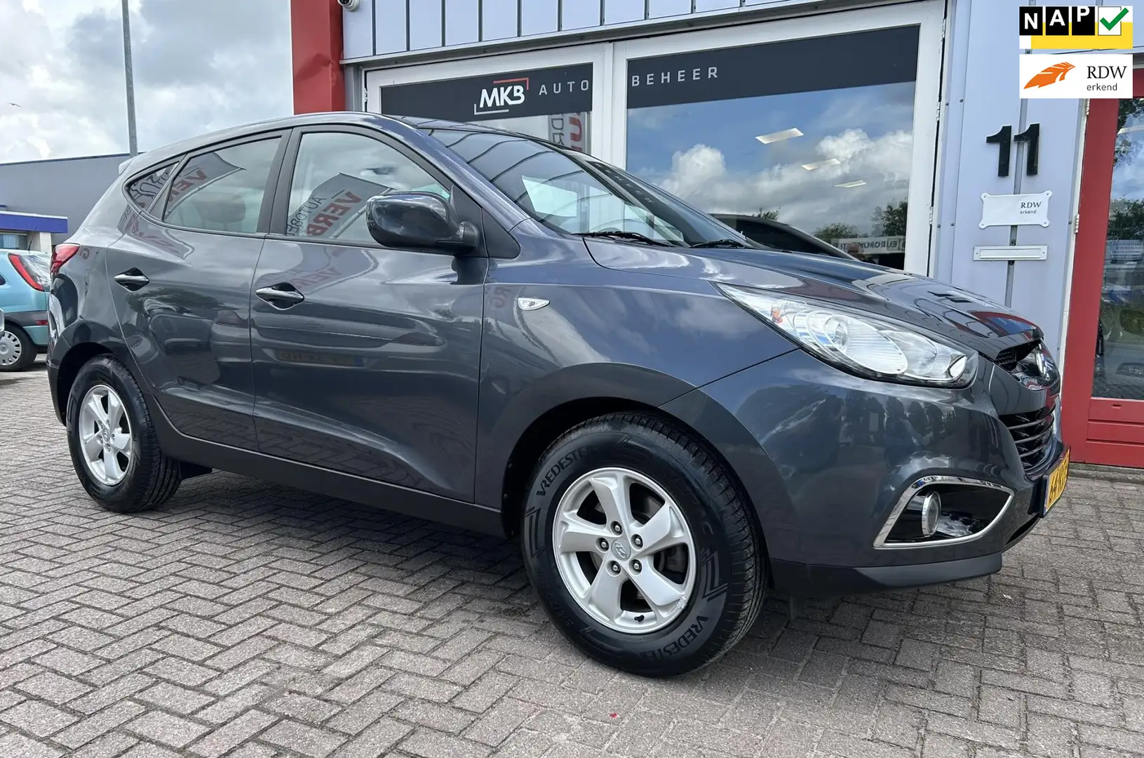 Hyundai iX35 2.0i Dynamic AUTOMAAT Trekhaak/CruiseControl Grijs - 1